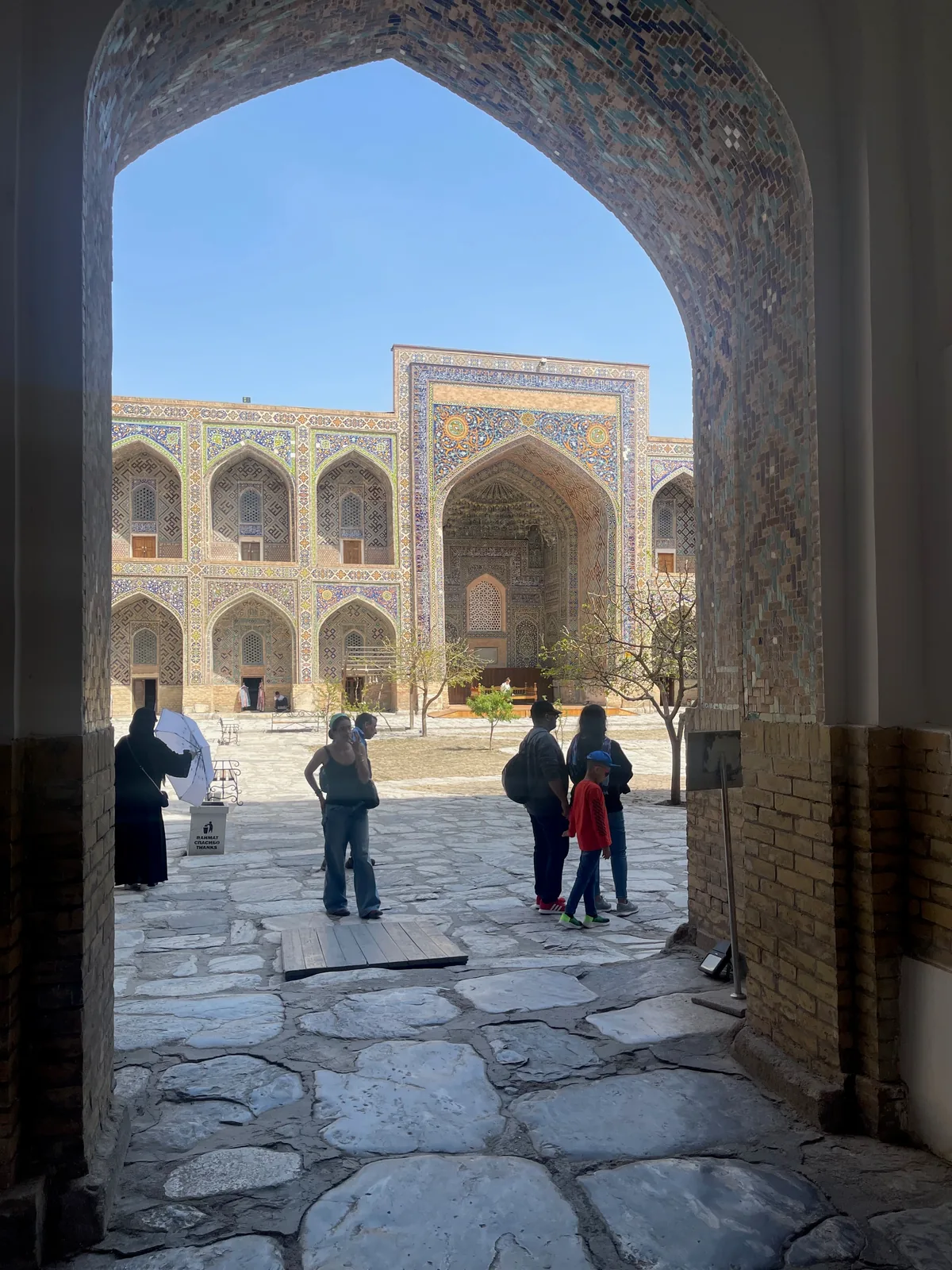 An arch opening into the courtyard of Sherdar Madrasah